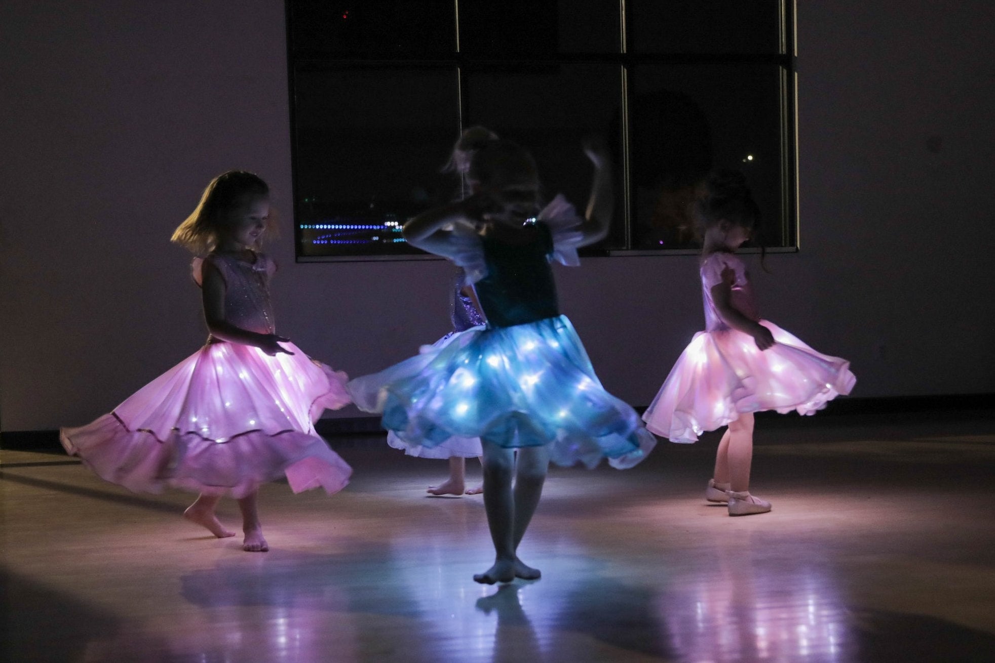 How It Works — girls in glowing dresses