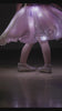 Close-up of a SpinBrite skirt lighting up mid-spin